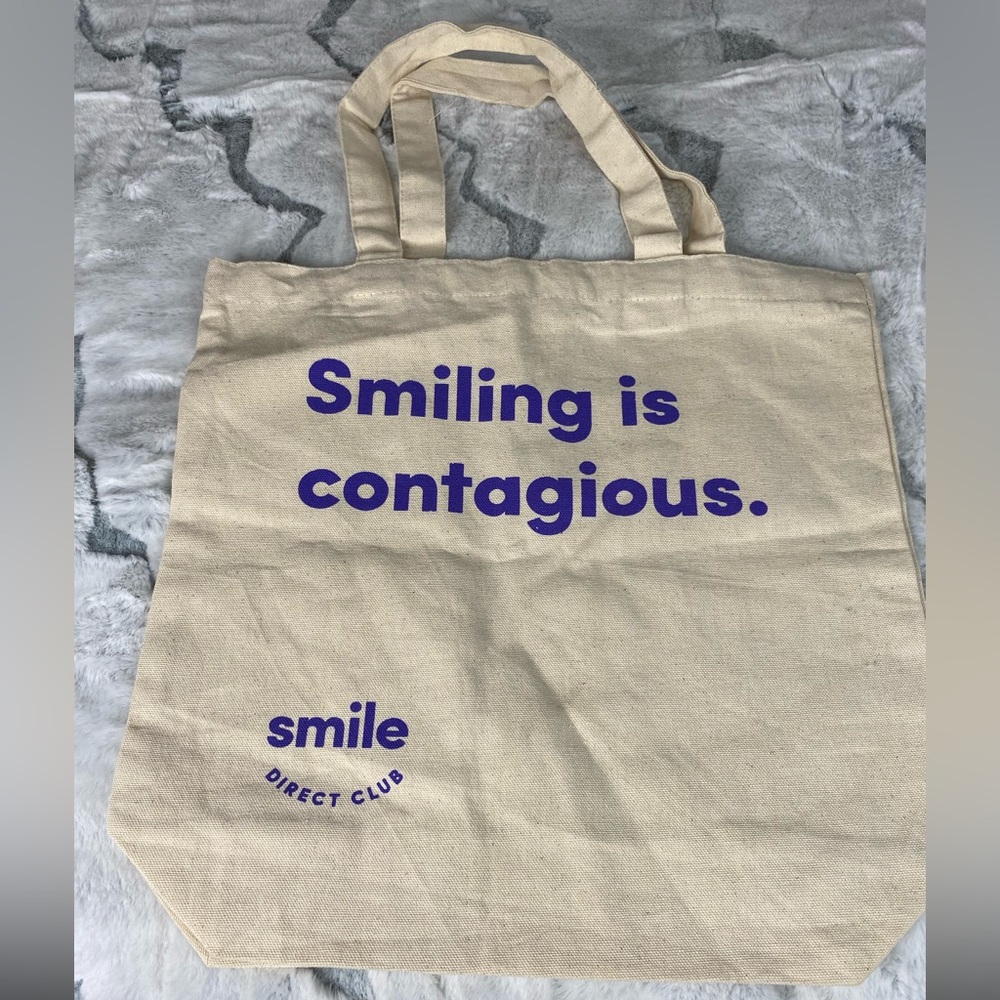 Smiling is contagious fun canvas tote bag